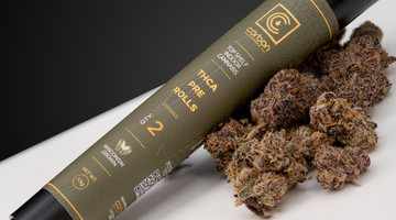 pre roll tube on top of cannabis nugs