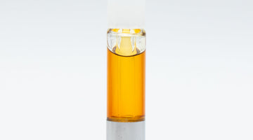 Vape cartridge with amber liquid concentrate