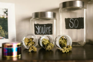 Cannabis jars on display shelf