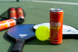 Pickleball gear with energy drink can