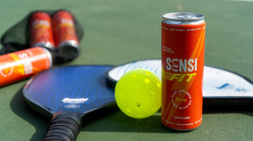 Pickleball gear with energy drink can