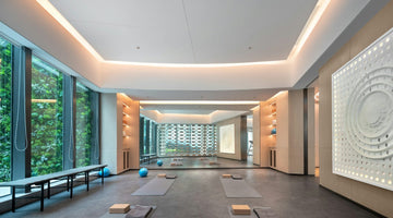 Modern yoga studio with mats and exercise balls