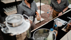 Outdoor cocktail preparation by bartenders