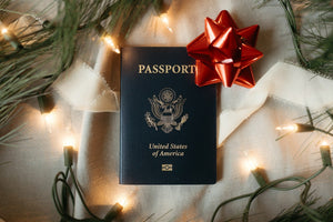 USA passport with festive decorations bow