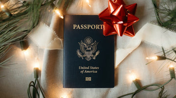 USA passport with festive decorations bow